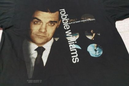 Discovering the Hidden Gems of Robbie Williams Official Shop: Collector's Edition